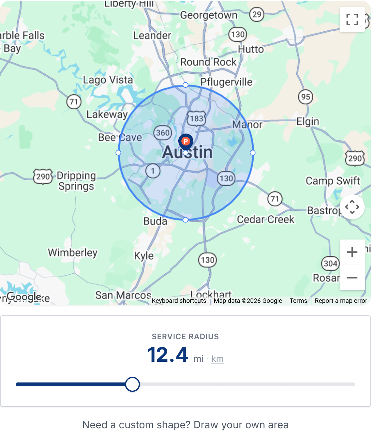 The service area map with a radius circle around the address, the radius slider, and the km and mi switch